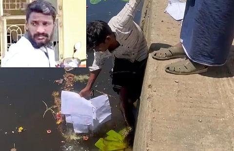 வைகை ஆற்றில் மனுக்கள் மிதந்த விவகாரம்: நில அளவை துறை உதவி வரைவாளர் கைது