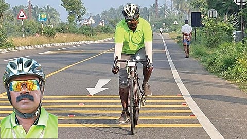 மதுரையிலிருந்து மானாமதுரையில் இருக்கும் பள்ளிக்கு சைக்கிளில் வரும் உடற்கல்வி ஆசிரியர் ராபின் சுந்தர்சிங்.