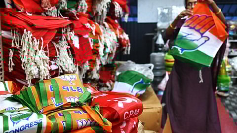 கேரள தேர்தலில் மார்க்சிஸ்ட் - காங்கிரஸ் அணிகள் இடையே கடும் போட்டி: கருத்துக் கணிப்பில் தகவல்