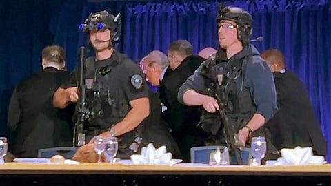 அமெரிக்க அதிபர் பங்கேற்ற விருந்தில் துப்பாக்கிச்சூடு: பத்திரமாக வெளியேறிய ட்ரம்ப்