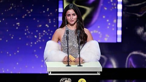 Alia Bhatt presents the Film Not in the English Language Award on stage during the EE BAFTA Film Awards 2026 at The Royal Festival Hall on February 22, 2026 in London, England