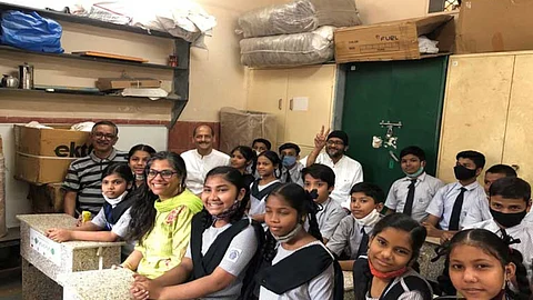 Collected cartons are taken and transformed into classroom furniture for underprivileged students nationwide.