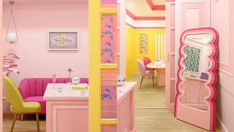 The G Story's Barbiecore-inspired office.