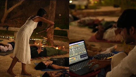 Harsh and Sahitya, known as the the duo, Dhrupad x Ableton performing at an event.
