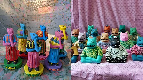 Images of Anand's Cat & Alien sculptures.