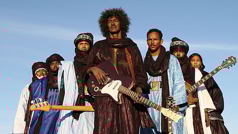 Tinariwen are historians of a stateless people — carrying the memory, rhythm, and rebellion of the Tuareg people across borders and generations.