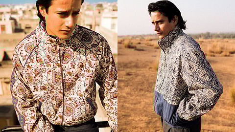 Handwork is central to the collection. Subtle embroidery appears across the pieces — star-like motifs referencing desert skies, kantha stitches running along panels, and small details that sit on top of the printed base.