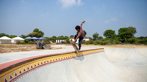 A skateboarder does their thing at Desert Dolphin Skatepark