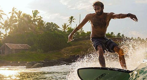 Kably surfing in Varkala.