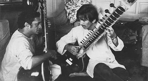 Watch: George Harrison's Sitar Lesson With Maestro Pandit Ravi Shankar