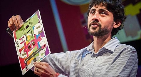 Manu Prakash giving a talk at an official TED conference