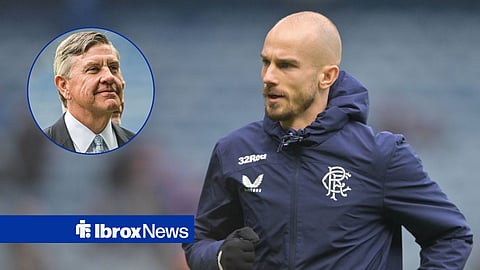 Rangers chairman Andrew Cavenagh smiles at Ibrox while looking at Vaclav Cerny, who is warming up.