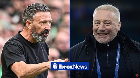 Derek McInnes ordering instructions from the touchline at Tynecastle Park alongside Ally McCoist, who is present at a UEFA Champions League contest.