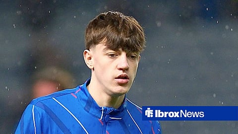 Lewis Stewart warming up in the rain before a Rangers game