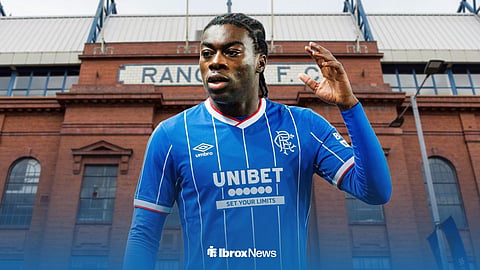 Zebedee Lawson in a Rangers kit outside of Ibrox.