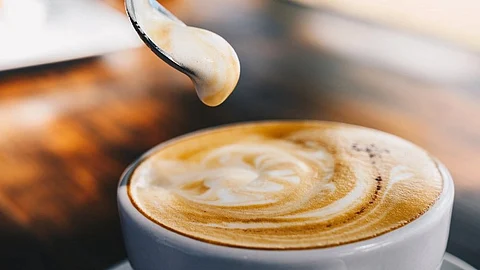 Here’s why coffee with milk is the way to go