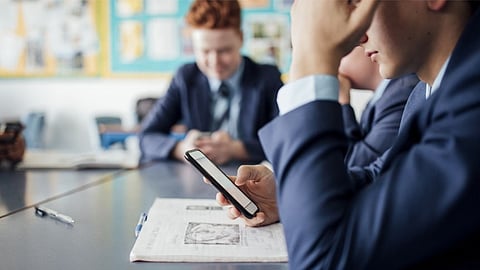 Mobile phone use banned in England schools for wellbeing