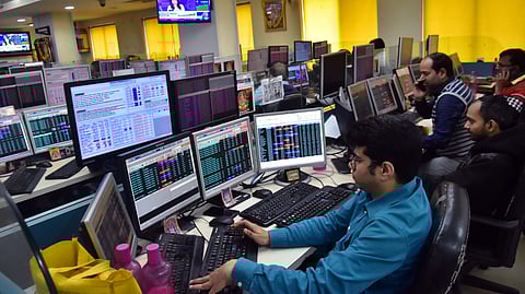 Traders work on the floor as the Sensex and Nifty hit highs amidst the second pandemic wave across the country. Today’s GST Council meeting could provide more succour to the markets if positive announcements are made.