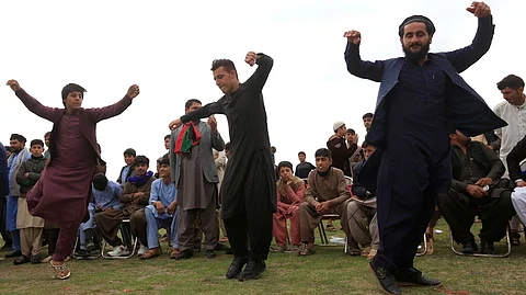 Once upon a time…. Afghan youth and peace activists gather as they celebrate the reduction in violence, in Jalalabad last year. With the eventual exit of foreign forces the situation on the ground in Afghanistan has altered drastically.