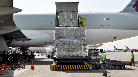 Gestures of friendship. An aircraft arrives with Covid-19 coronavirus relief supplies from the UK at the Indira Gandhi International Cargo Terminal, in New Delhi on Monday.