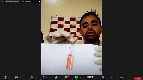 During a WQM course, a field team member from INREM facilitating a demonstration