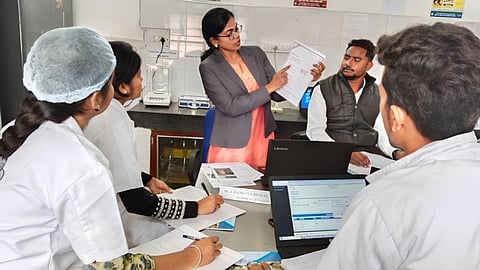 Ms. Chandana Biswal using the Safe Water Learning Cards to train other Chemists and Lab Assistants in her District. (Image: Chandana Biswal)