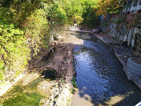 A view of the polluted Ambil Odha as it flows from road near Bal Shivaji Chowk located in Dattawadi, Pune