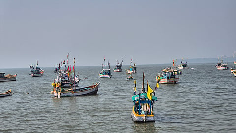 boats in front of the Gateway of India in the morning, a quiet journey across the sea.