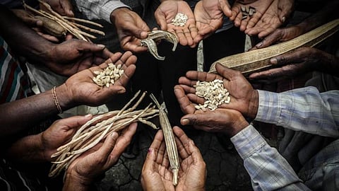 Joining hands to cope with climate change (Image Source: Usha Dewani Das)