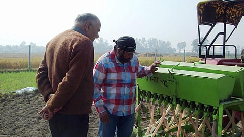 Seed-fertilizer drill in use at Kalwaheri village