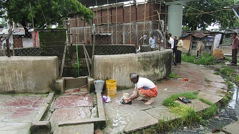 Open well in Hira mill ki chaal slum situated next to an open drain resulting in its water getting polluted.