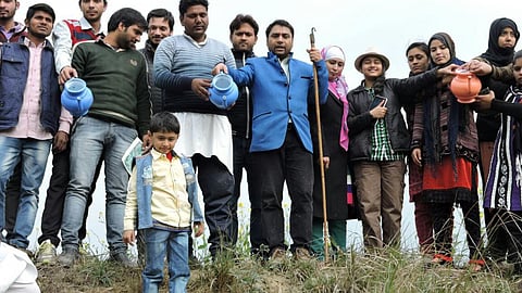 A “one house, one pot” symbolic water donation movement was conducted over the years for river Katha. (Image: Mustaquim Mallah)