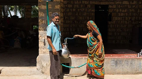 AKRSP has promoted rainwater harvesting to address the issue of scarce potable water at Mangrol. By encouraging households to collect rainwater using pipes on their roofs which then drain into an underground tank they have been able to promote water security. (Image: Aga Khan Foundation Flickr)