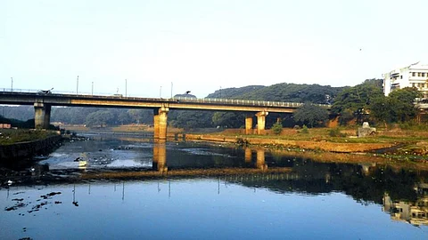 The highly polluted Mutha river as it flows through Pune. (Image Source: India Water Portal)