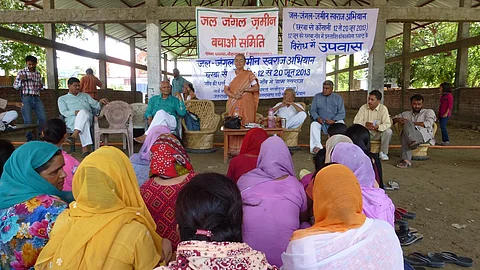 Radha Behen addresses the villagers