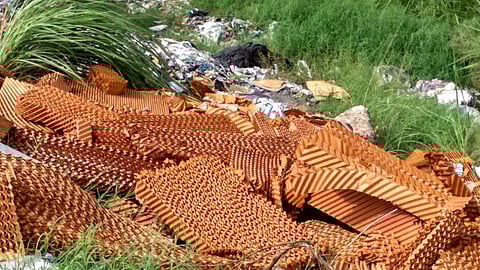 Leftover materials tossed out by the factories at the footwear park. These will end up in landfills and pollute the environment. (Image: India Water Portal)