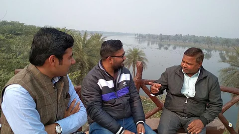 The forest department and local activists discuss the threats on Surajpur, an urban wetland encroached upon by private real estate as well as the government. (Image: India Water Portal)