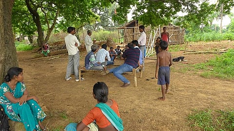 Meetings as usual: Men talk, while women watch