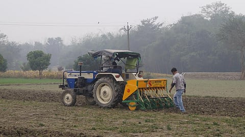 Zero tillage machine mounted on a tractor.