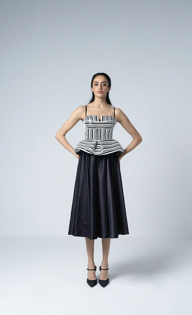 Sweet Nothings cotton bralette paired with a structured skirt—balancing softness and power in modern