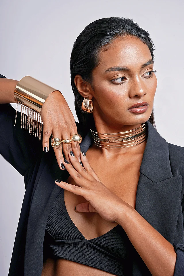 Joker & Witch’s Liquid Gold capsule collection—fluid gold-tone jewellery designed as wearable art.