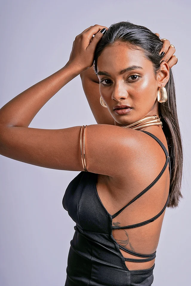 Editorial shot of Joker & Witch’s Liquid Gold collection—highlighting the duality of strength and softness in gold-toned accessories.