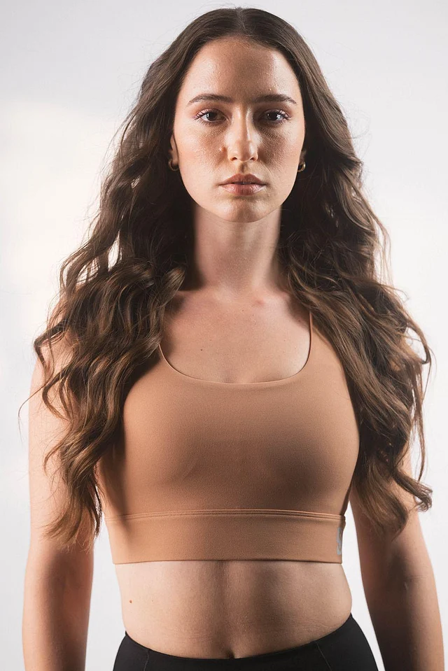 Model in fitted crop tank