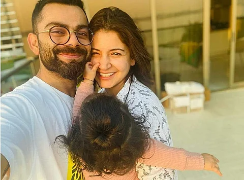 Virat Kohli and Anushka Sharma with their daughter, Vamika. (Image: Instagram/Virat Kohli)