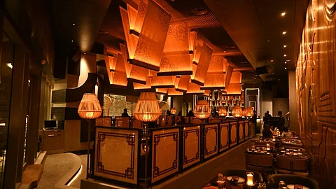Yazu boasts an impressive bar menu filled with signature cocktails, spirits, and tonics.
