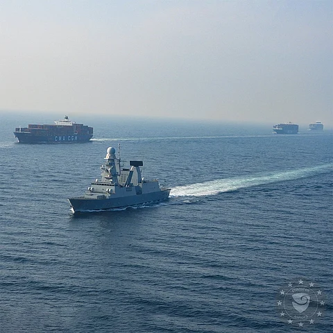 Italian destroyer Andrea Doria provides close protection to the merchant ships in Red Sea.