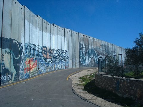 Art painted on a barrier in the West Bank.