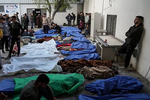 Bodies of Palestinians killed by Israeli strikes at the Gaza City hospital.