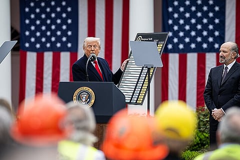 Donald Trump with new Presidential tariff chart, 2 April 2025