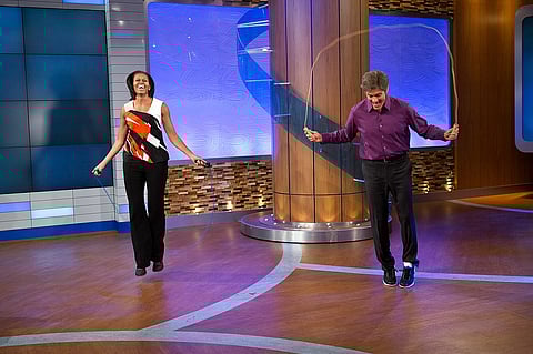 Michelle Obama and Dr. Mehmet Oz jump rope during a taping of the “Dr. Oz Show,” August 2012
